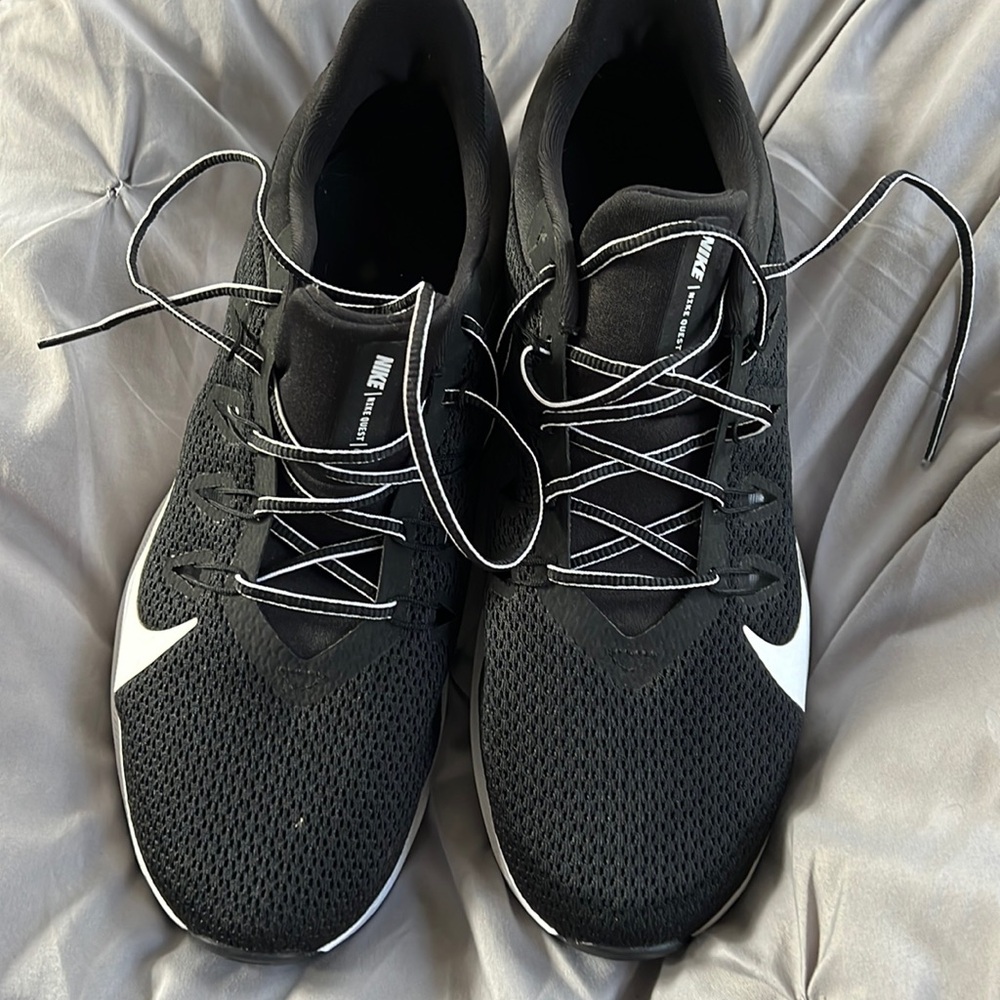 Men’s Nike Quest running shoes. Size 9.5. Never worn.